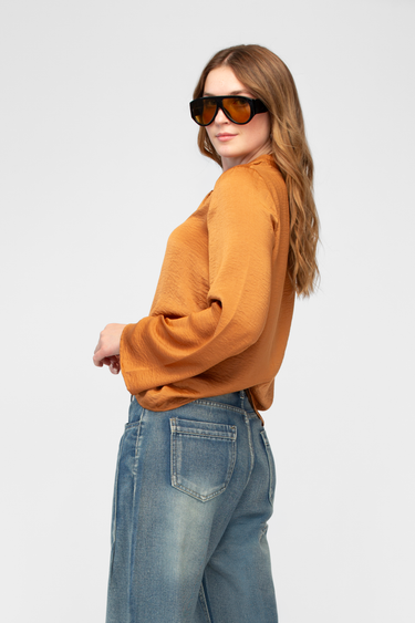Blusa Con Amarre En Cuello Manga Larga Amplia
